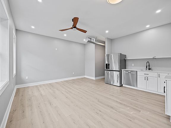 Open concept kitchen/dining/living room