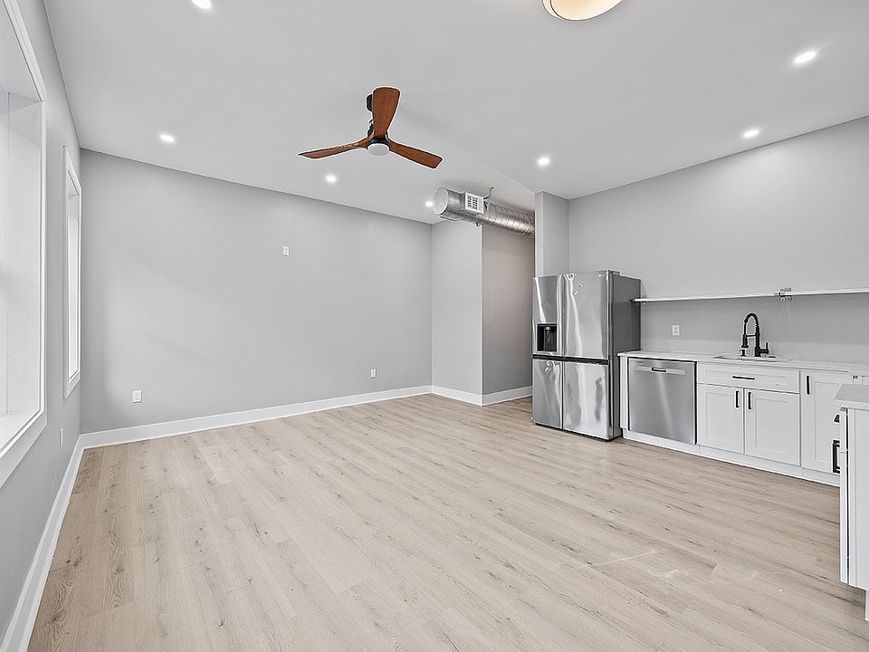 Open concept kitchen/dining/living room