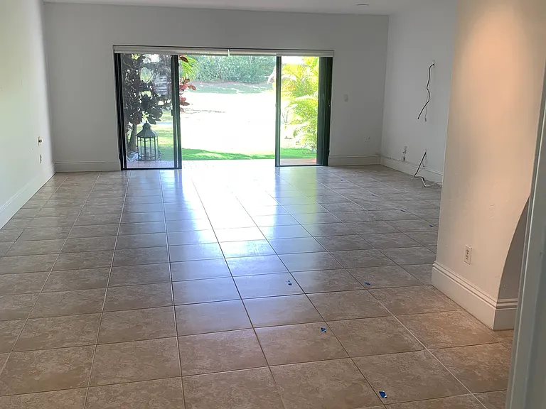 Lving Area leads out to private terrace and expansive fenced shared green.