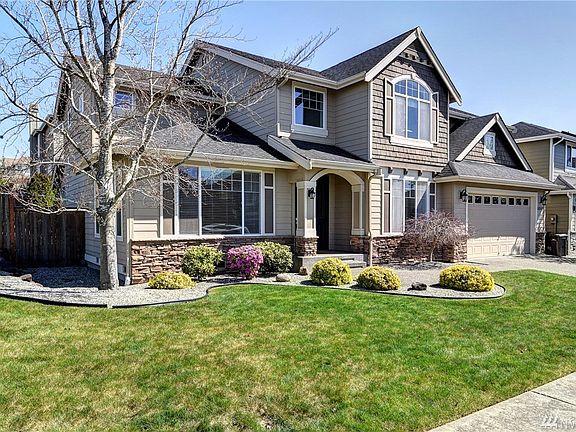 Stunning exterior. Beautifully landscaped yard. Walk to highly rated schools. 