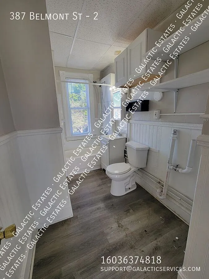 3 bed 1 bath 2nd floor apartment with deck, 3 season room, and large storage room — Photo 4
