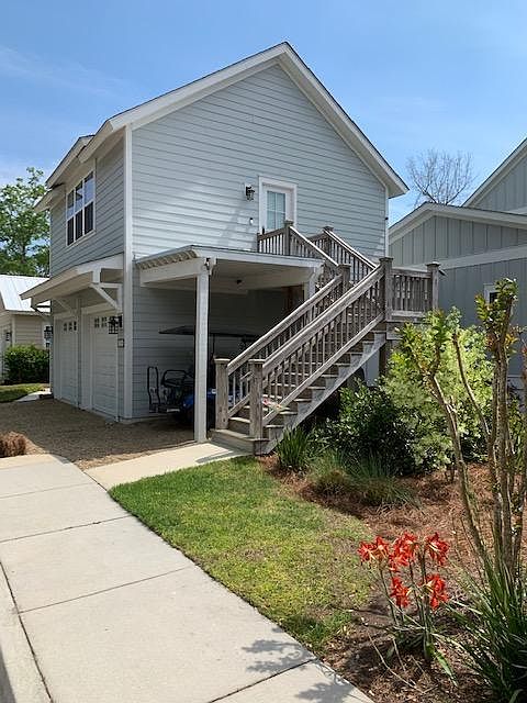 Outside stair way leading to landing and door with digital key pad