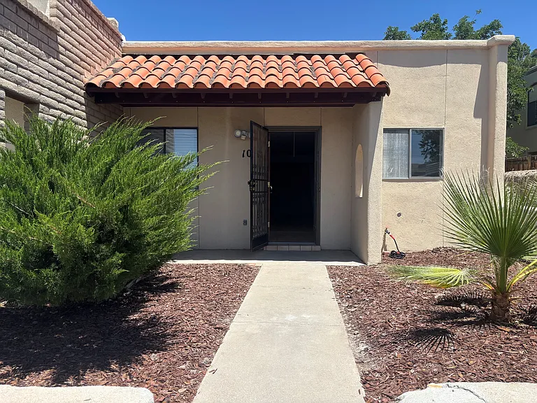 Front entrance with patio faces south