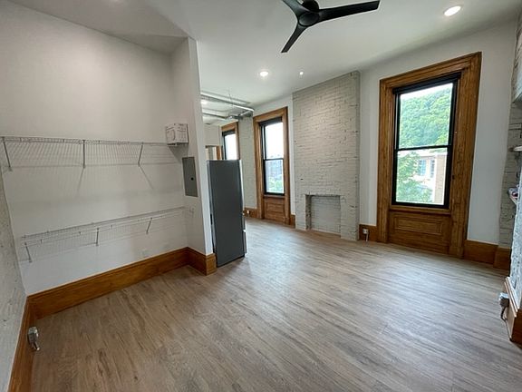 Closet; Exposed brick; Tall windows