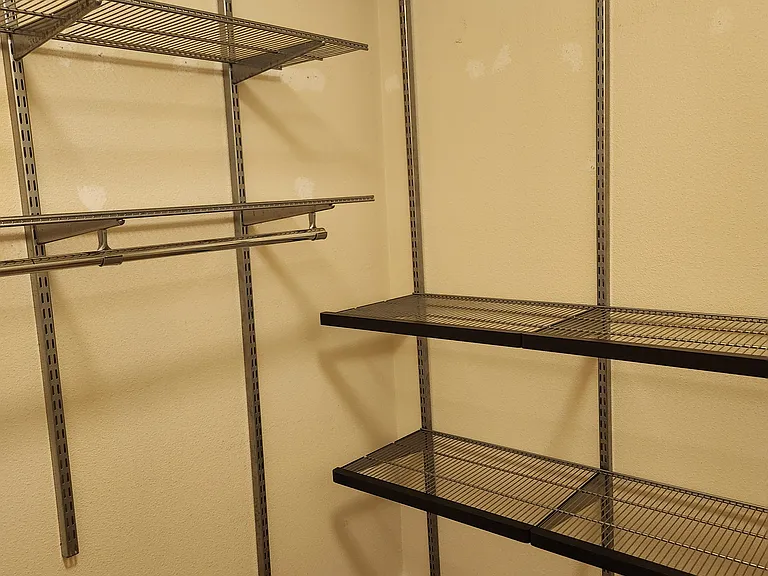 Walk in closet with Elfa storage system