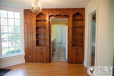 Formal dining area with built in cabinets