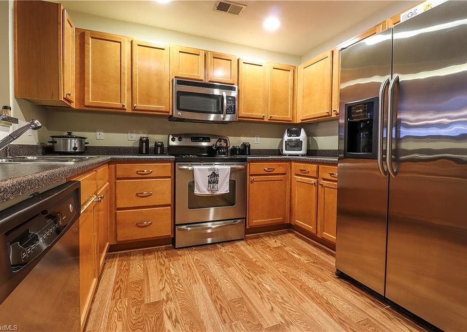1st image of 7106 W Friendly Ave Unit 204