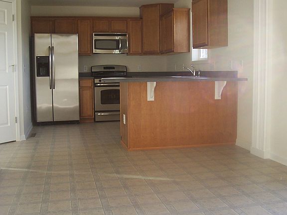Eat-in Kitchen with Maple Cabinets