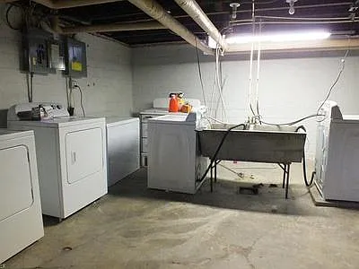 Dry basement with separate washer and dryer for each unit