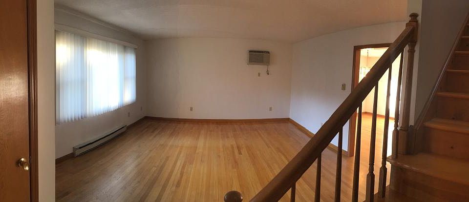 Living room: Fits two large couches or a wrap around couch