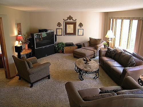Spacious family room w/ main floor office to left