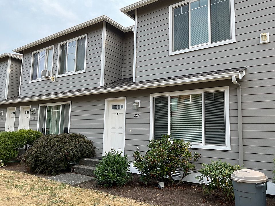 Freshly painted exterior in August and new landscaping in 2023