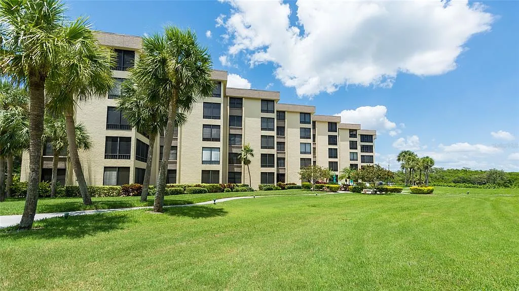 Building Photo - 8767 Midnight Pass Rd #506F