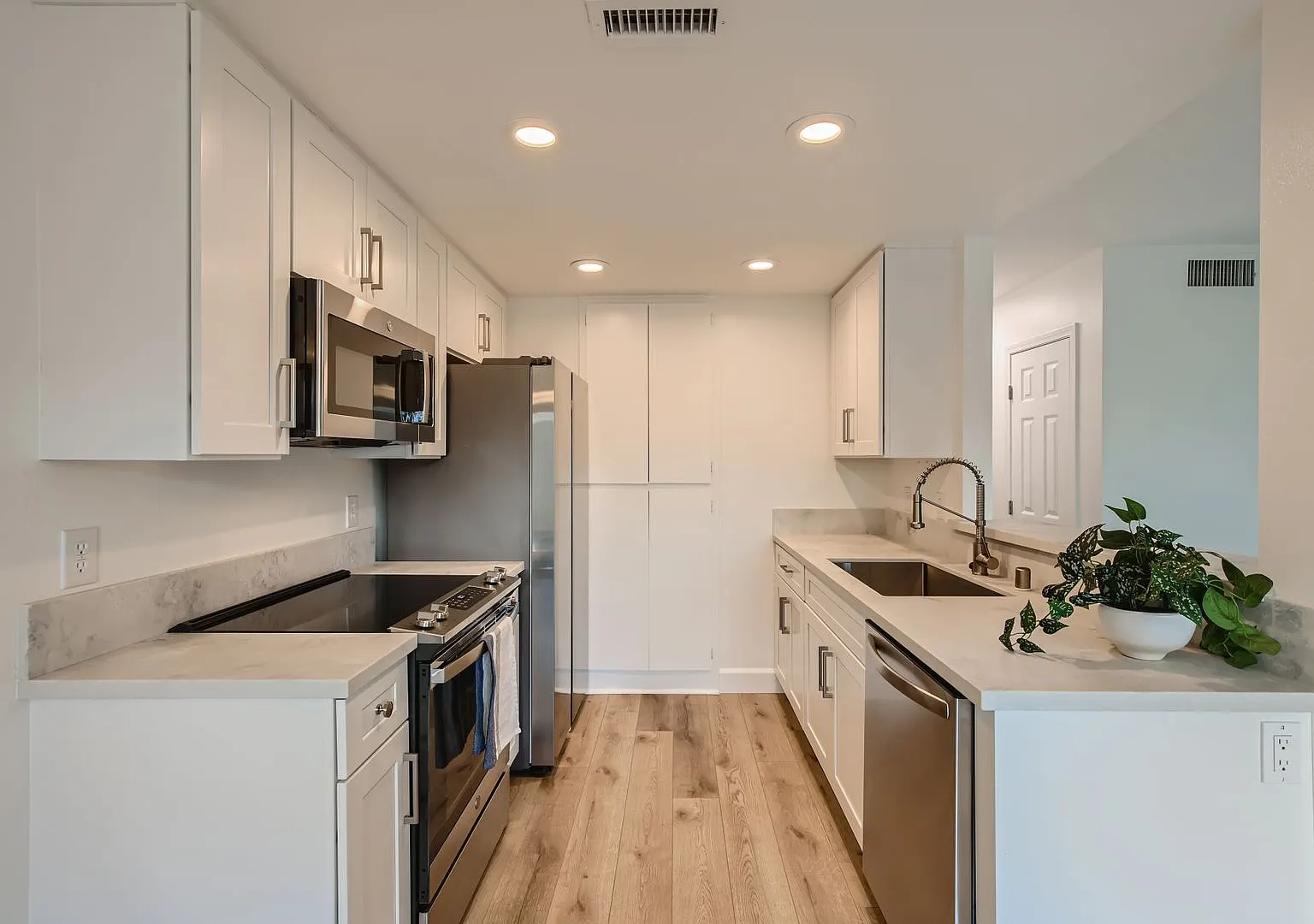 Recently Renovated!! - 3 Bedroom/2 Bath First floor corner unit with 2 car garage and A/C — Photo 1