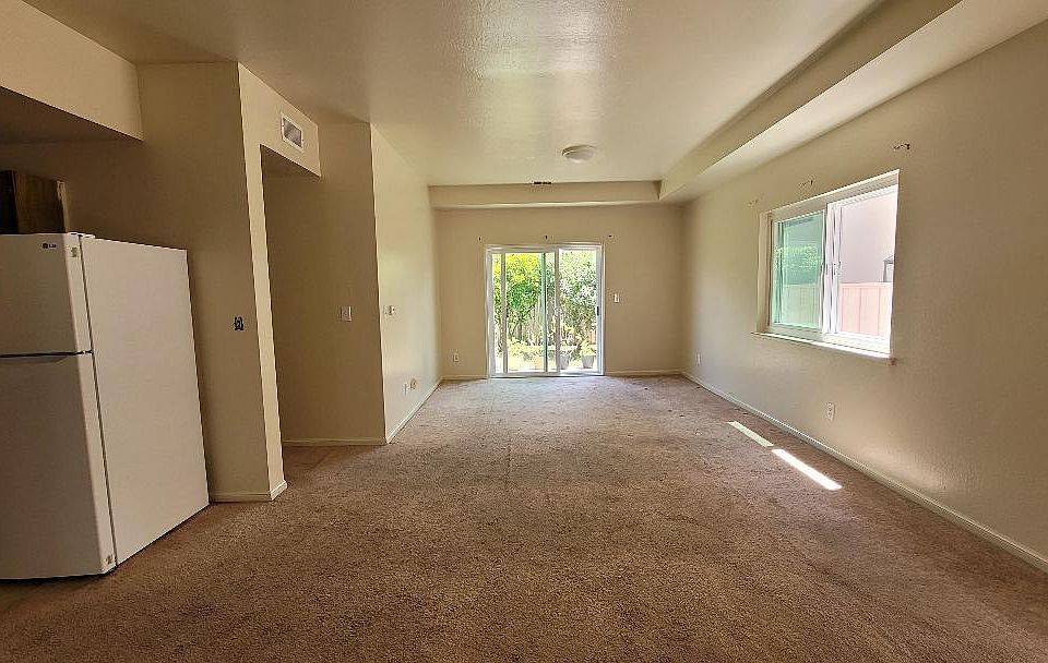 Living Room and Dinning Room leading to backyard