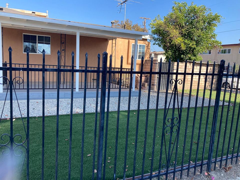 Low maintenance yard with covered porch