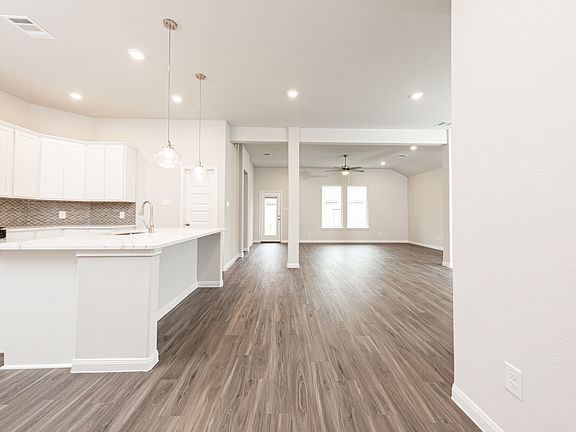 Entry to Kitchen, Dining Area, and Family Room