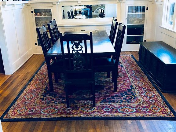 Dining Room with Built in Wine Cabinets (wrap around chair r