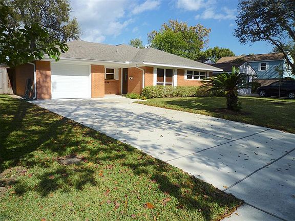 Great curb appeal. Driveway was replaced. Lovely landscaping.