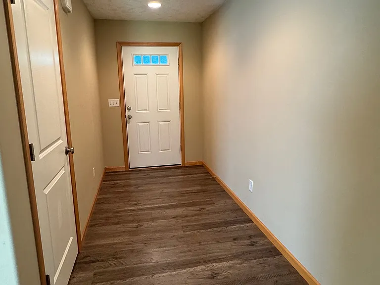 Entry way with hall closet