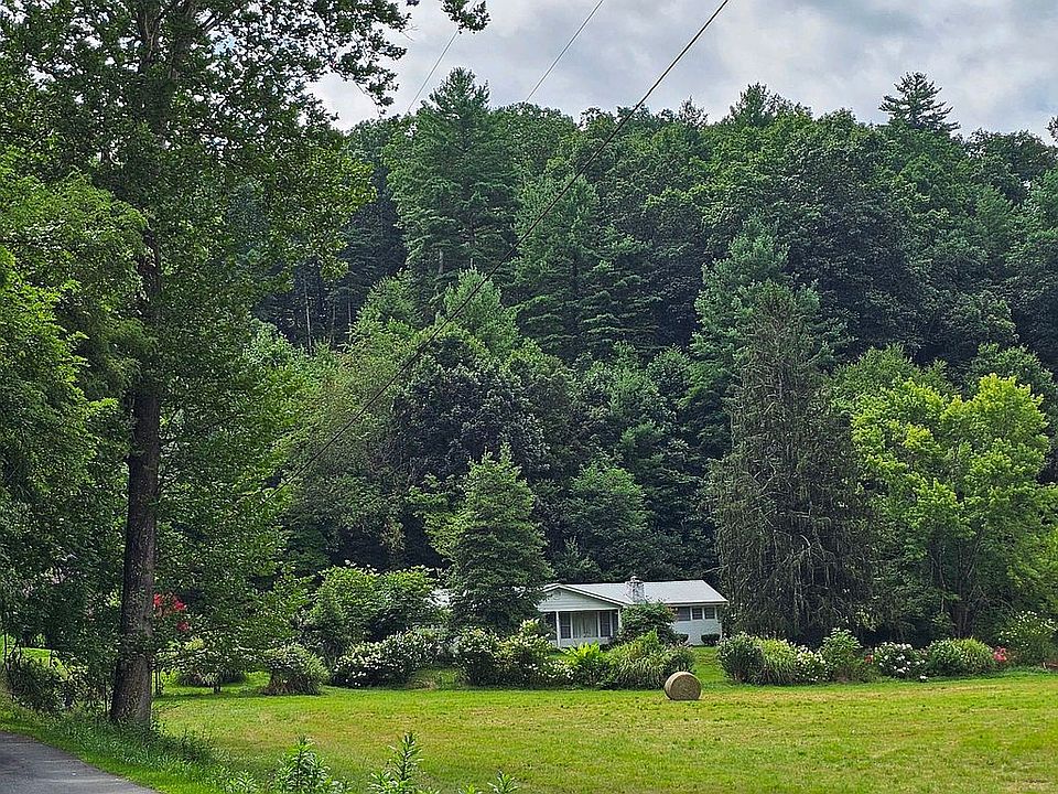 House and trees, field. 