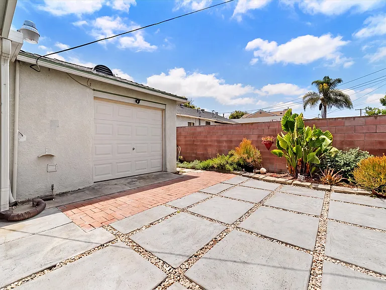 View of backyard side of the garage