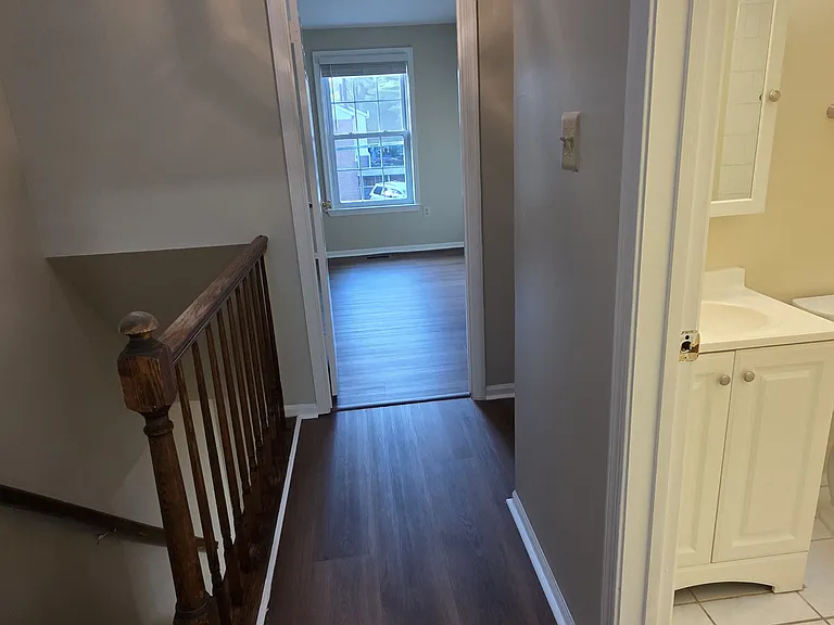 Upper Level Hall to 2nd and 3rd Bedroom New Vinyl Plank Flooring