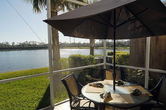 peaceful screened lanai on quiet lake