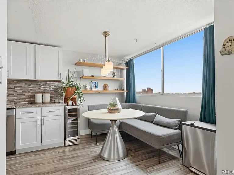 Eat-in kitchen with stainless steel appliances