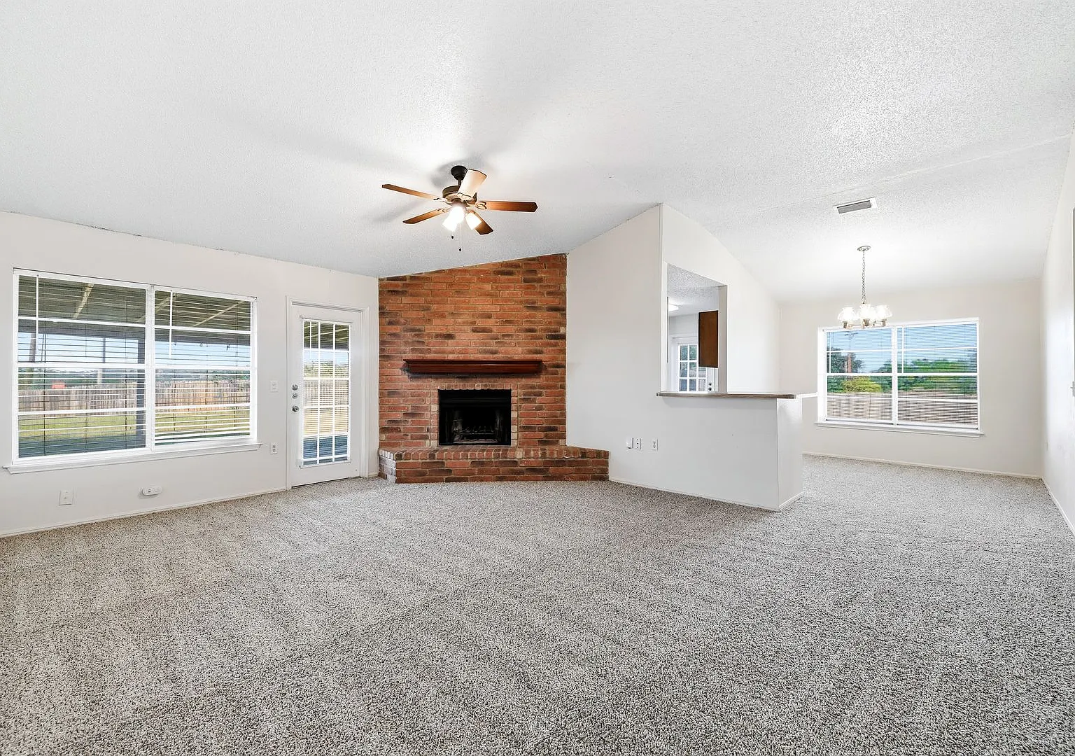 Beautiful Brick-Front Home with Spacious Living Areas & Private Backyard — Photo 3