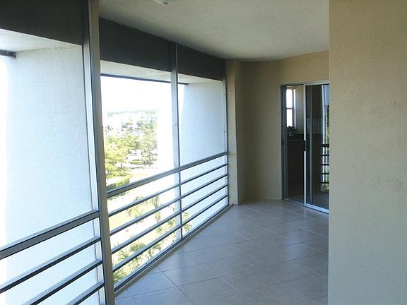 Access the balcony from the kitchen, living room and master