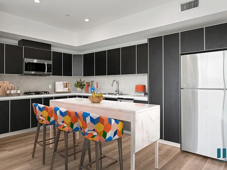 Open-Concept Kitchen with a Refrigerator, Mirowave Oven, Dishwasher, and Washer/Dryer - Aspen Floor Plan