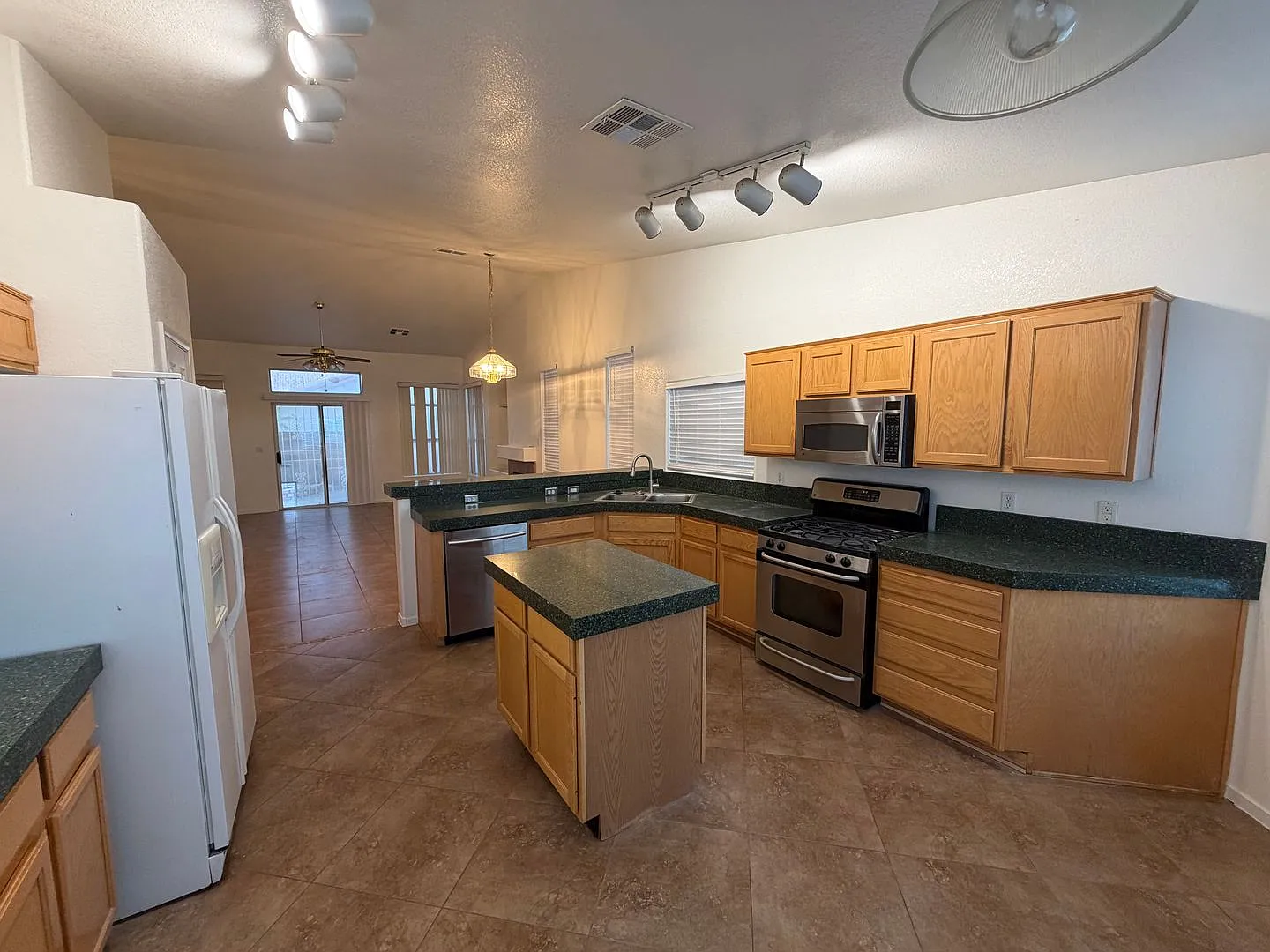 Spacious 3 Bedroom Home with Upgraded Garage & Private Backyard — Photo 3