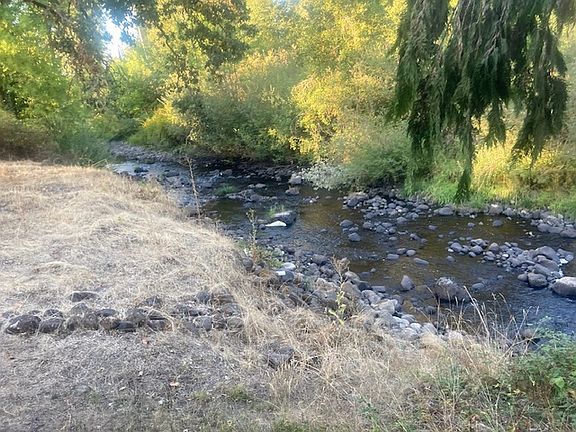 view of creek from back yard, creek access