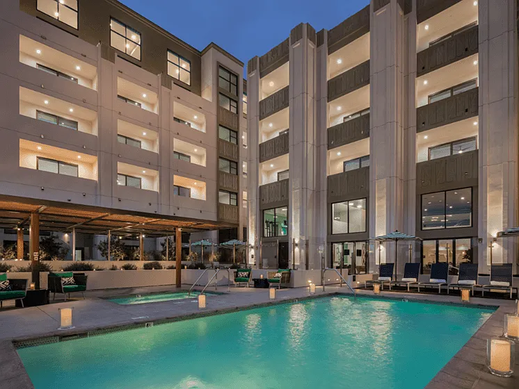 Sparkling Heated Resort Style Pool and Spa with Cabanas