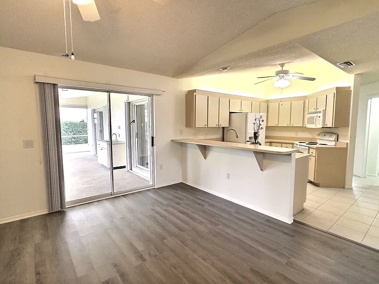 Kitchen opens up to a spacious lanai