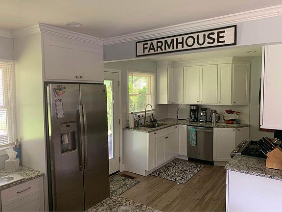Renovated kitchen with stainless steel GE appliances