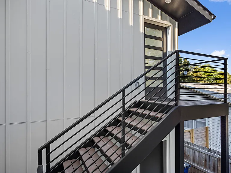 Stairs leading to the apartment.