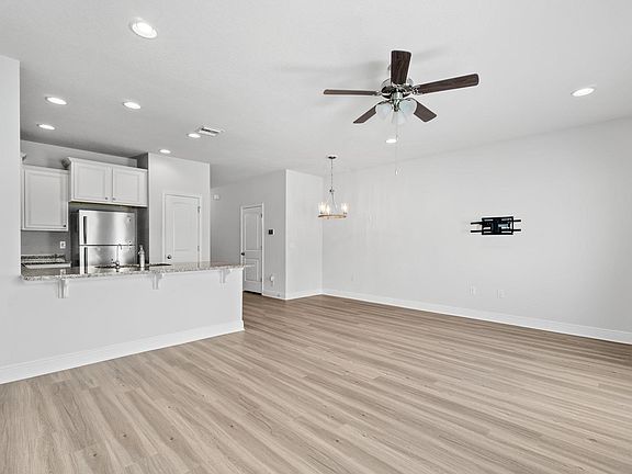 Large open living and dining space.