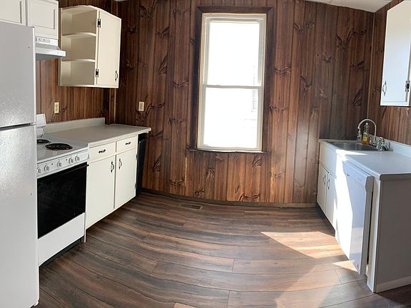 Recently renovated kitchen with dishwasher.