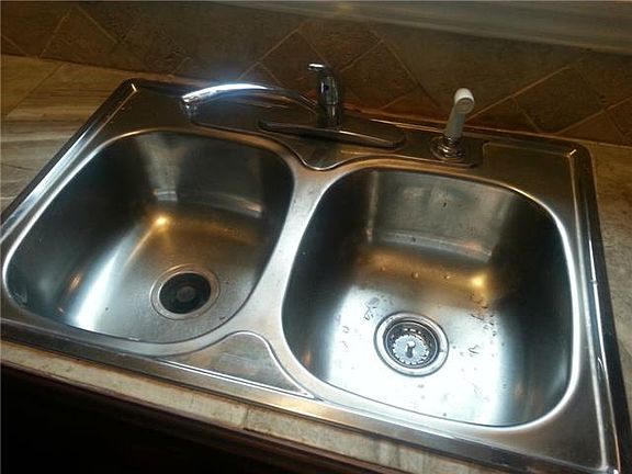 Lots of new plumbing in this house. This is the kitchen sin