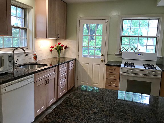 Modern open kitchen with granite countertops