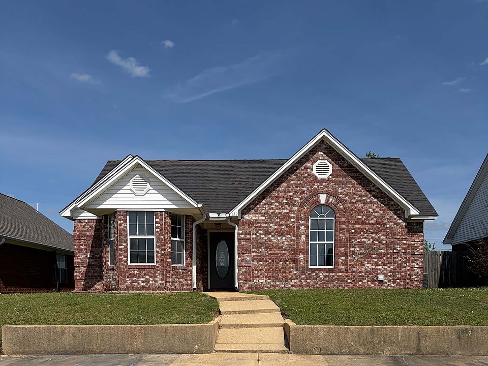 Front of home, parking in front.