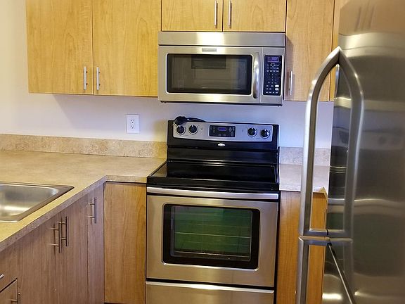 plenty storage spaces under & above the counter