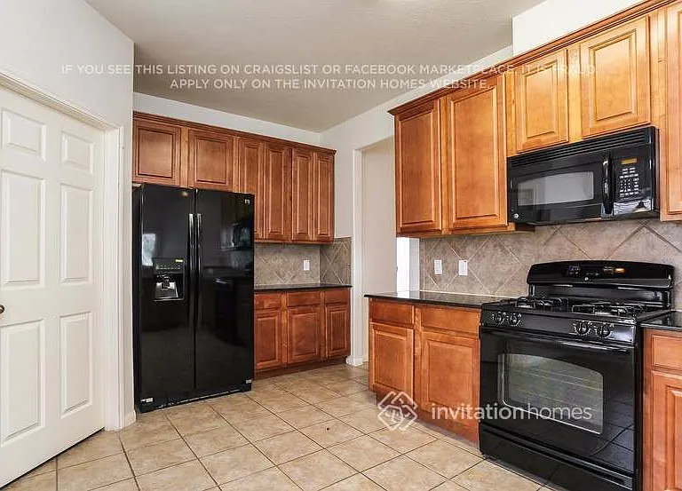 8903 Rolling Rapids Rd — Photo 6