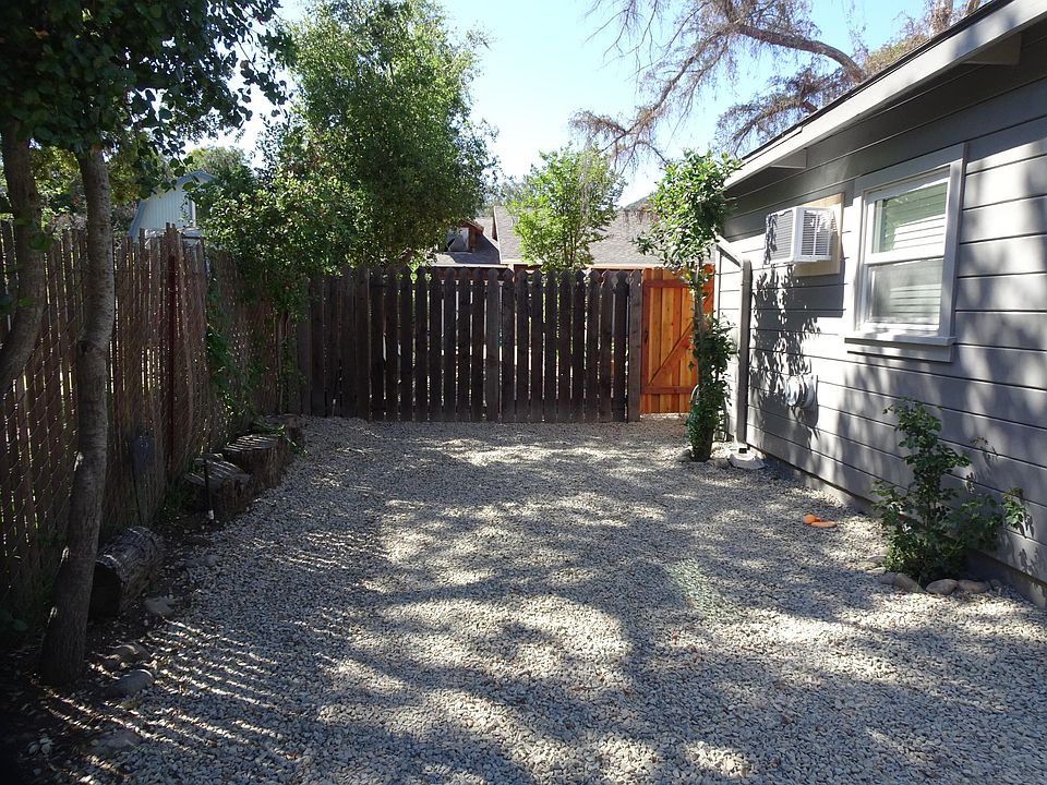 Driveway leading to the gated entry