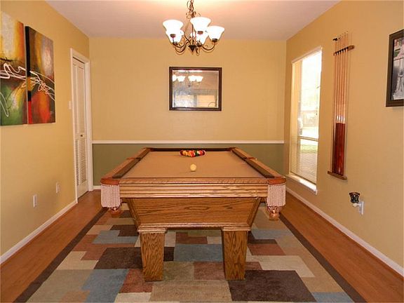 Den can be used as a dining room combo or flex space.