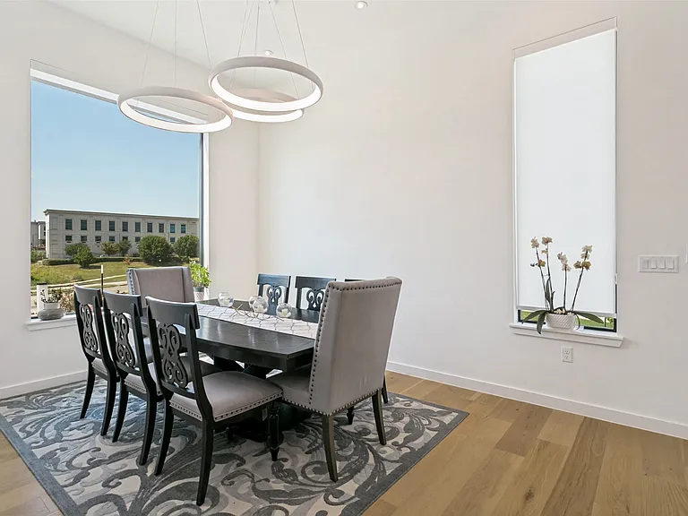 Specious dining room with plenty of natural light!