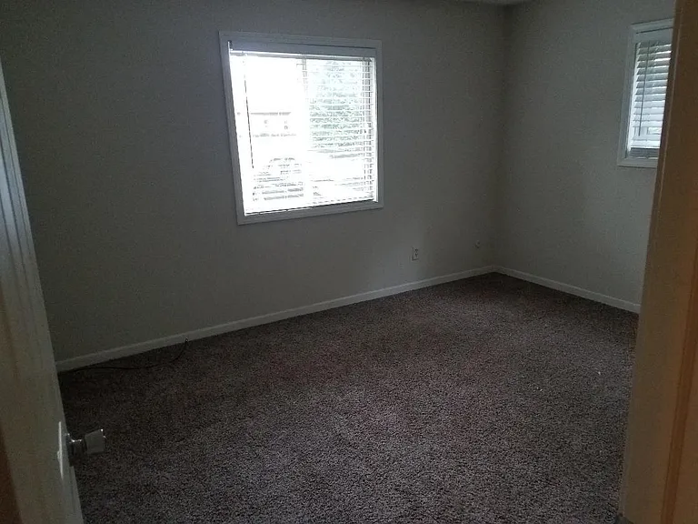 Carpet has been replaced with new laminate flooring in bedroom #1