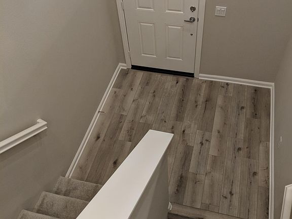 Front entrance landing. Downstairs is 4th BR, laundry & gara